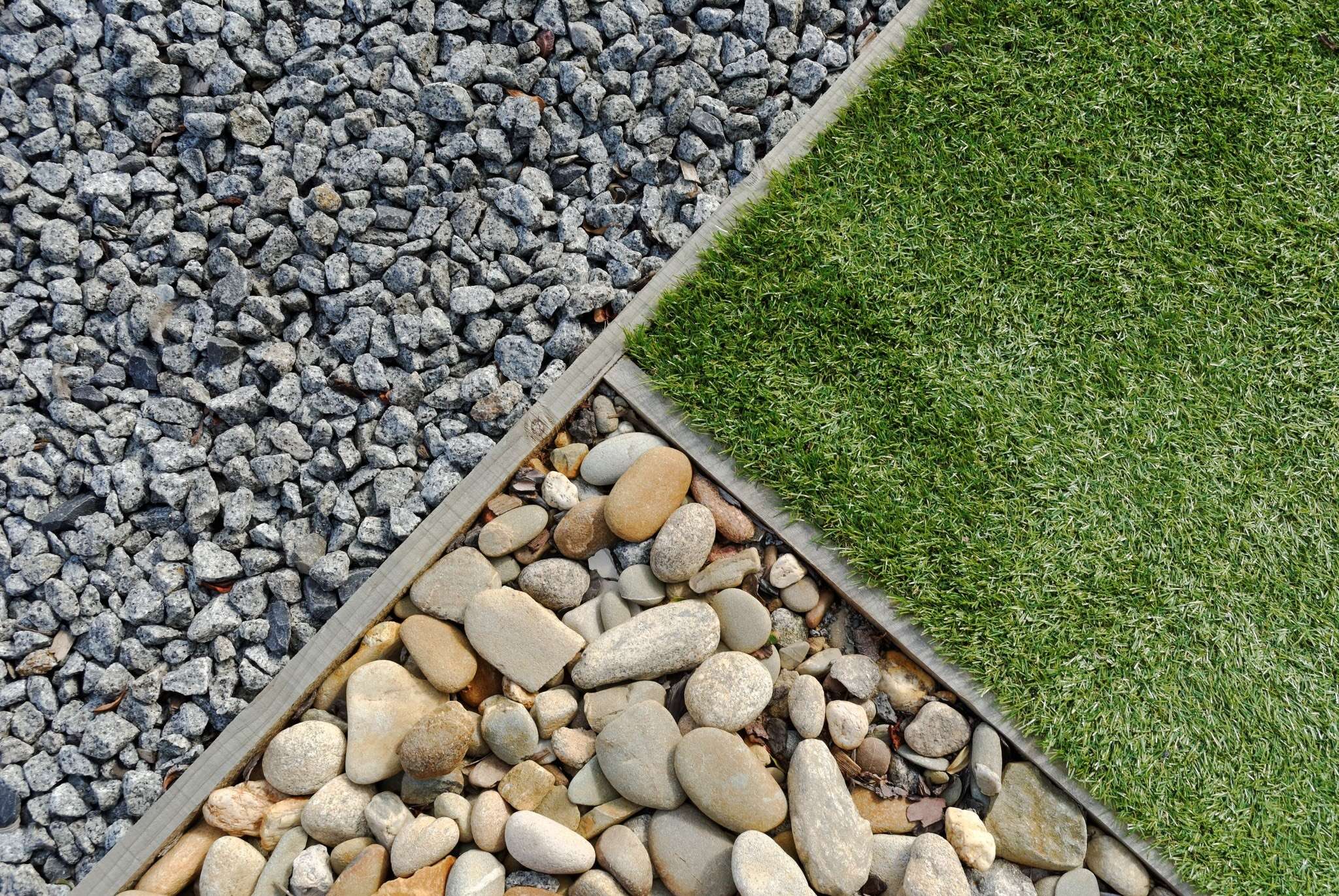 Landscaping combinations of grass, pebble and stones
